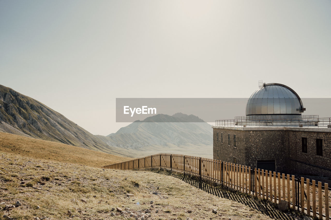 Scenic view of mountains against clear sky