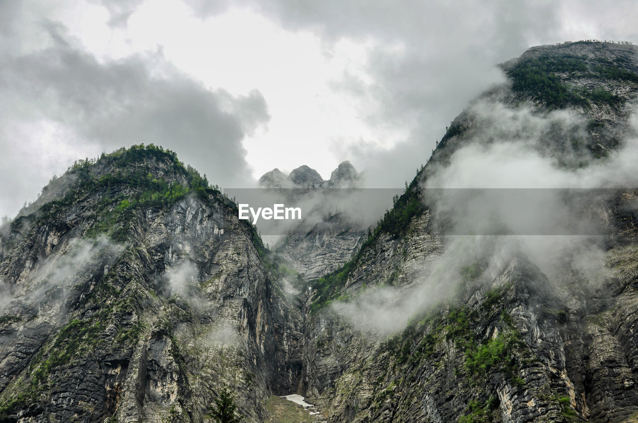 Low angle view of mountains against sky