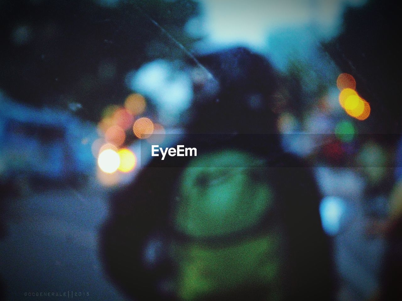 Defocused image of person on street