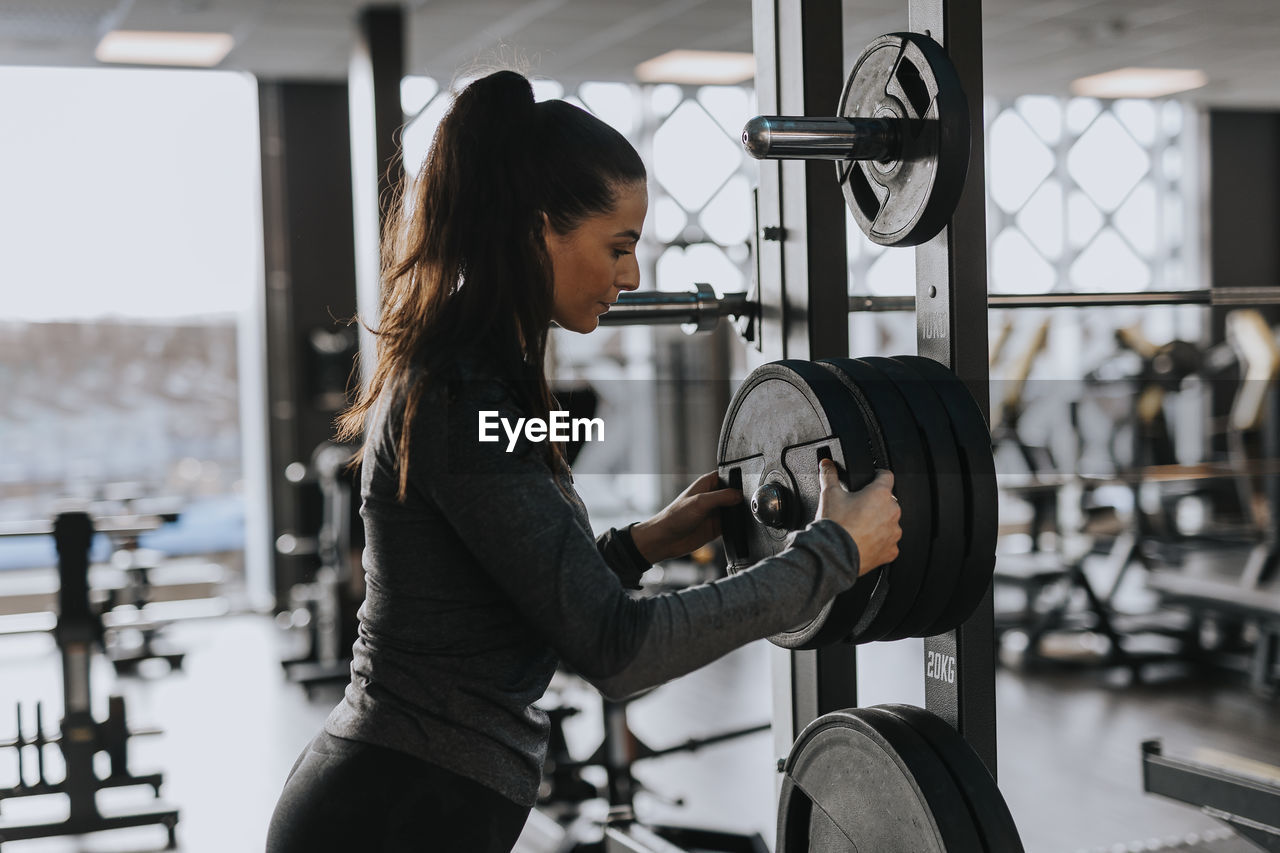 Woman exercising in gym