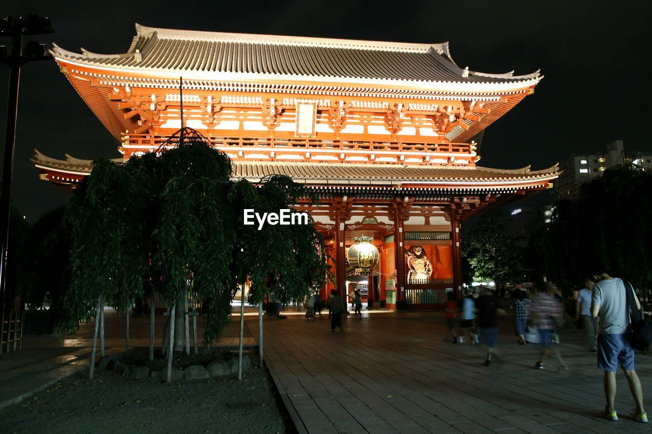 ILLUMINATED TEMPLE AGAINST SKY