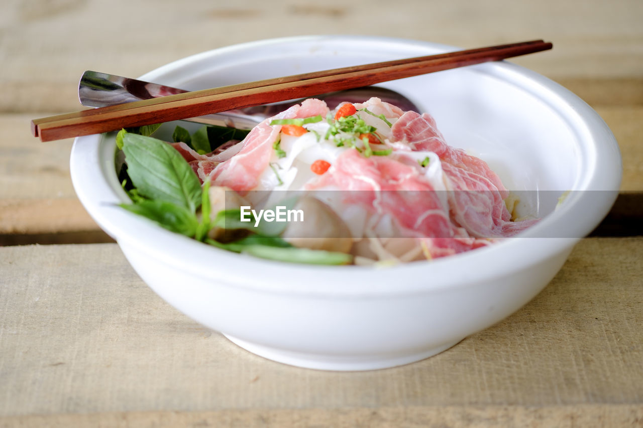 Close-up of salad in bowl on table