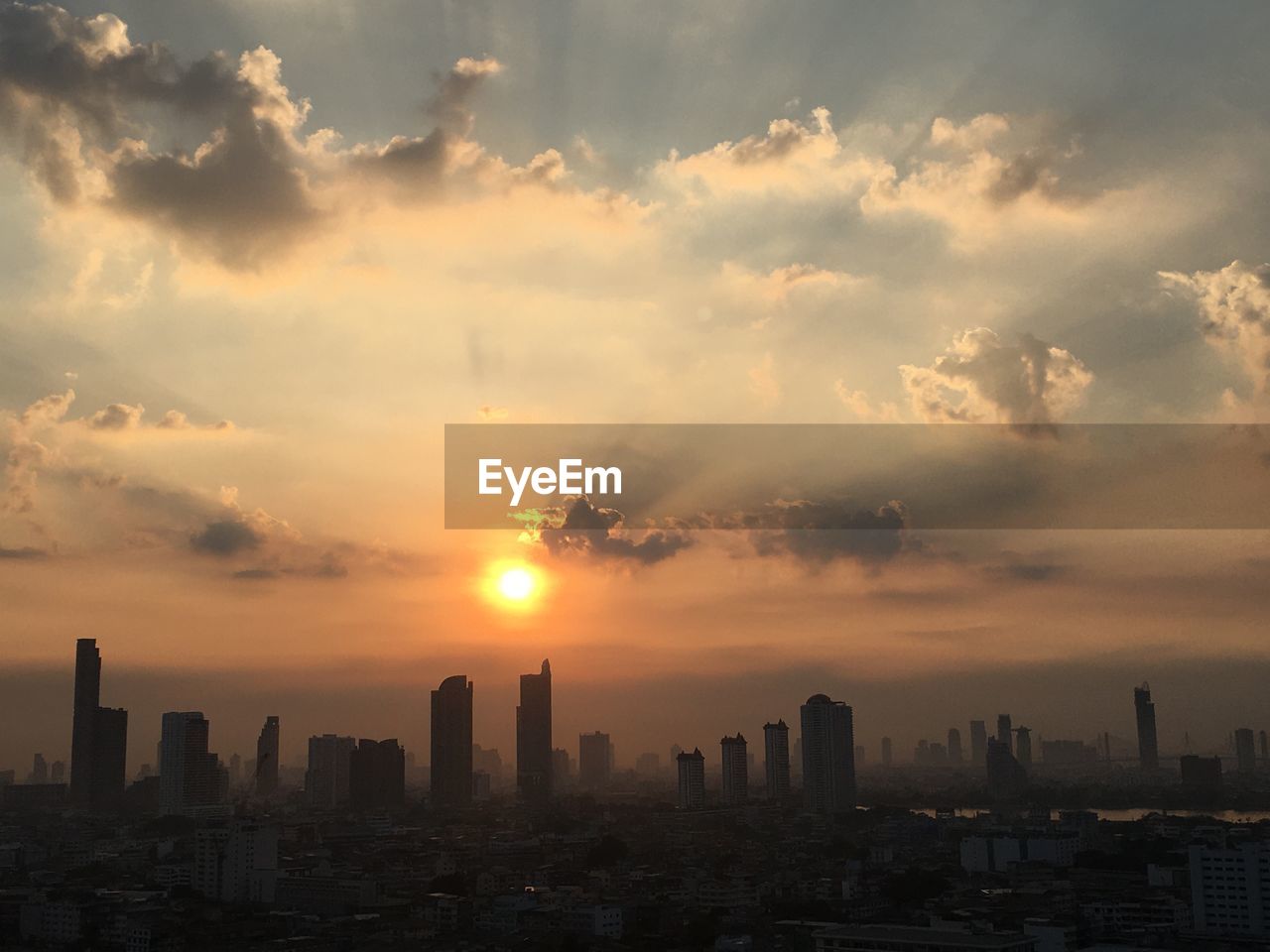 city, sky, architecture, building exterior, landscape, cityscape, horizon, built structure, urban skyline, building, cloud, office building exterior, skyscraper, sunset, skyline, nature, dawn, residential district, city life, afterglow, travel destinations, dramatic sky, sunlight, downtown district, daytime, environment, no people, evening, outdoors, cloudscape, sun, travel, scenics - nature, high angle view, metropolitan area, silhouette, development, tower, urban area, business, fog, beauty in nature