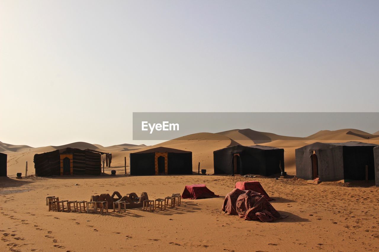 VIEW OF BEACH HUT IN DESERT