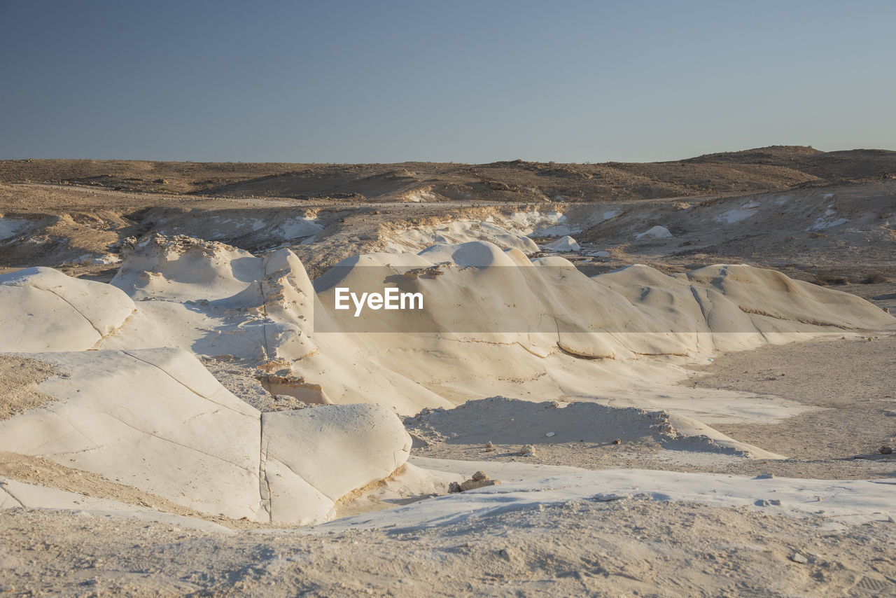 Beautiful lunar landscape. wight and smooth hills. the whitish, smooth chalk rocks. israel.
