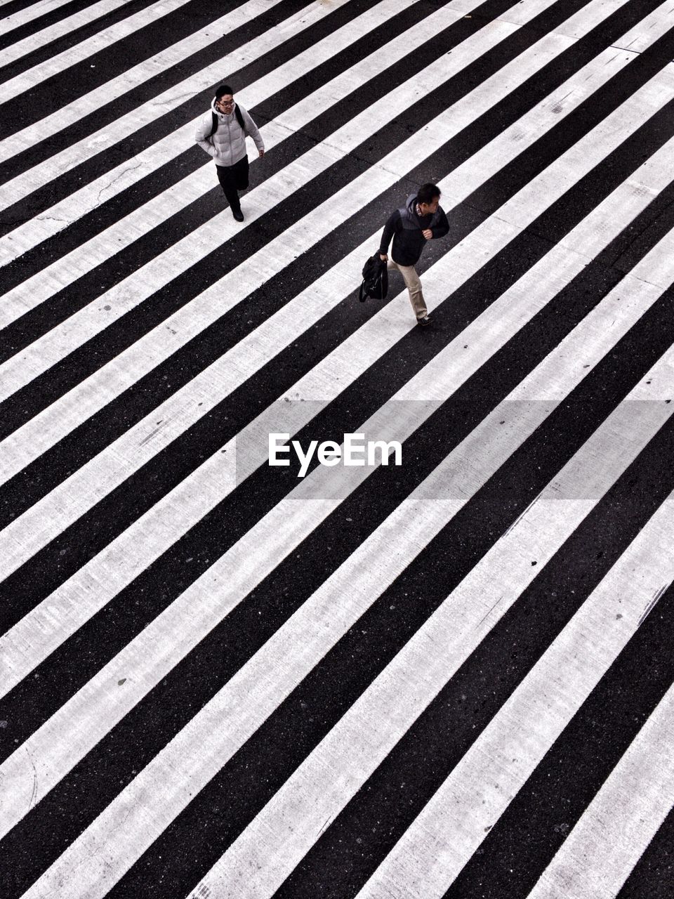 People walking on zebra crossing