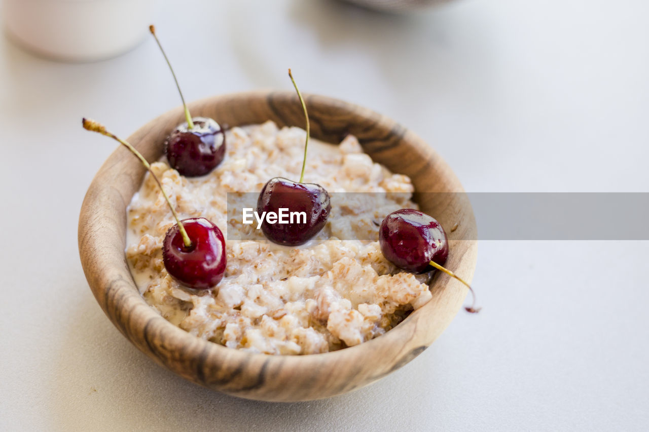 Close-up of breakfast in wooden bowl on table