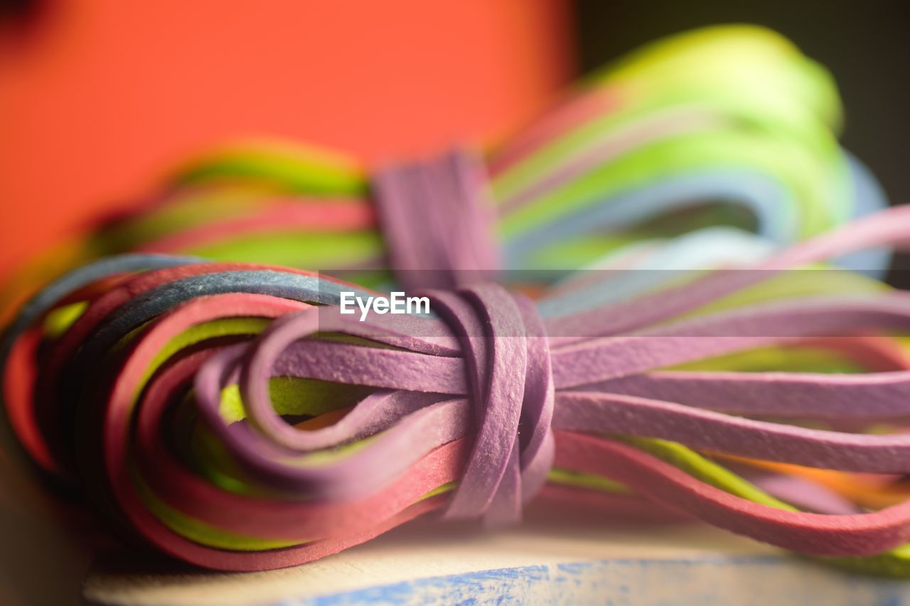 Close-up of multi colored rubber bands