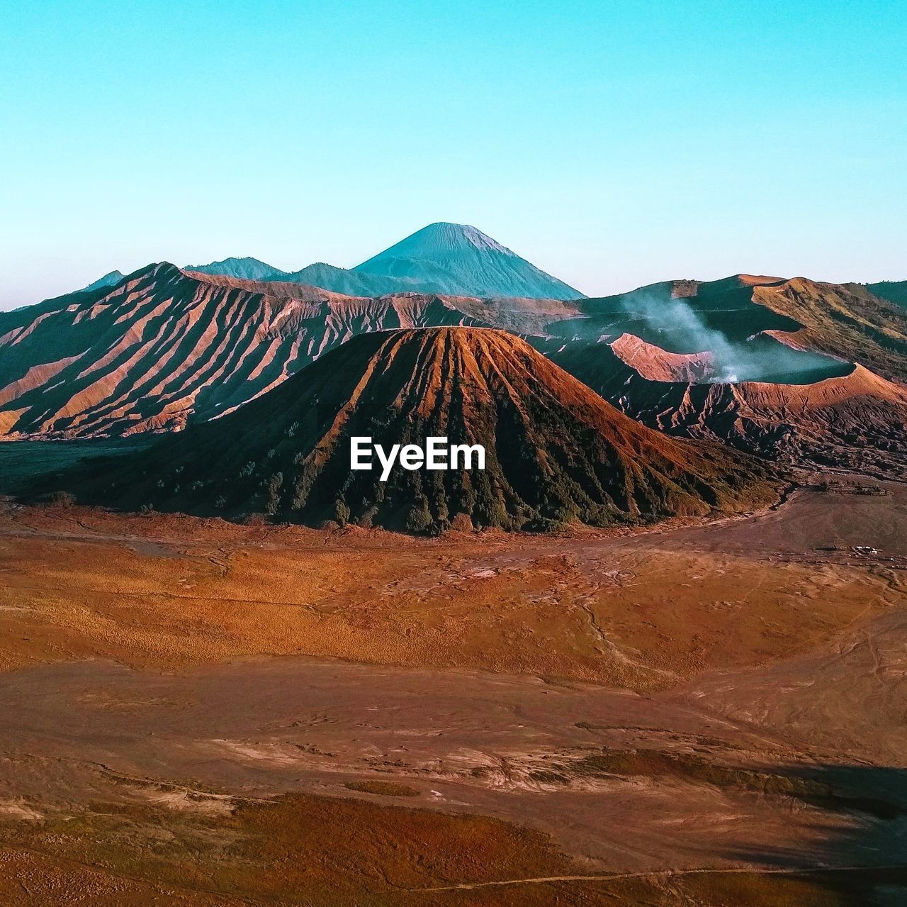 Scenic view of desert against clear sky