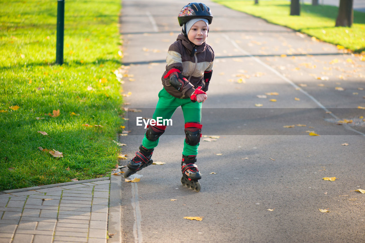 Full length of boy skating at park