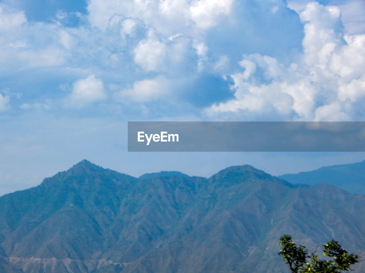 mountain, environment, sky, landscape, cloud, scenics - nature, mountain range, beauty in nature, nature, travel destinations, land, travel, tree, no people, plant, blue, outdoors, tranquility, tourism, day, non-urban scene, tranquil scene, plateau, mountain peak, ridge, forest