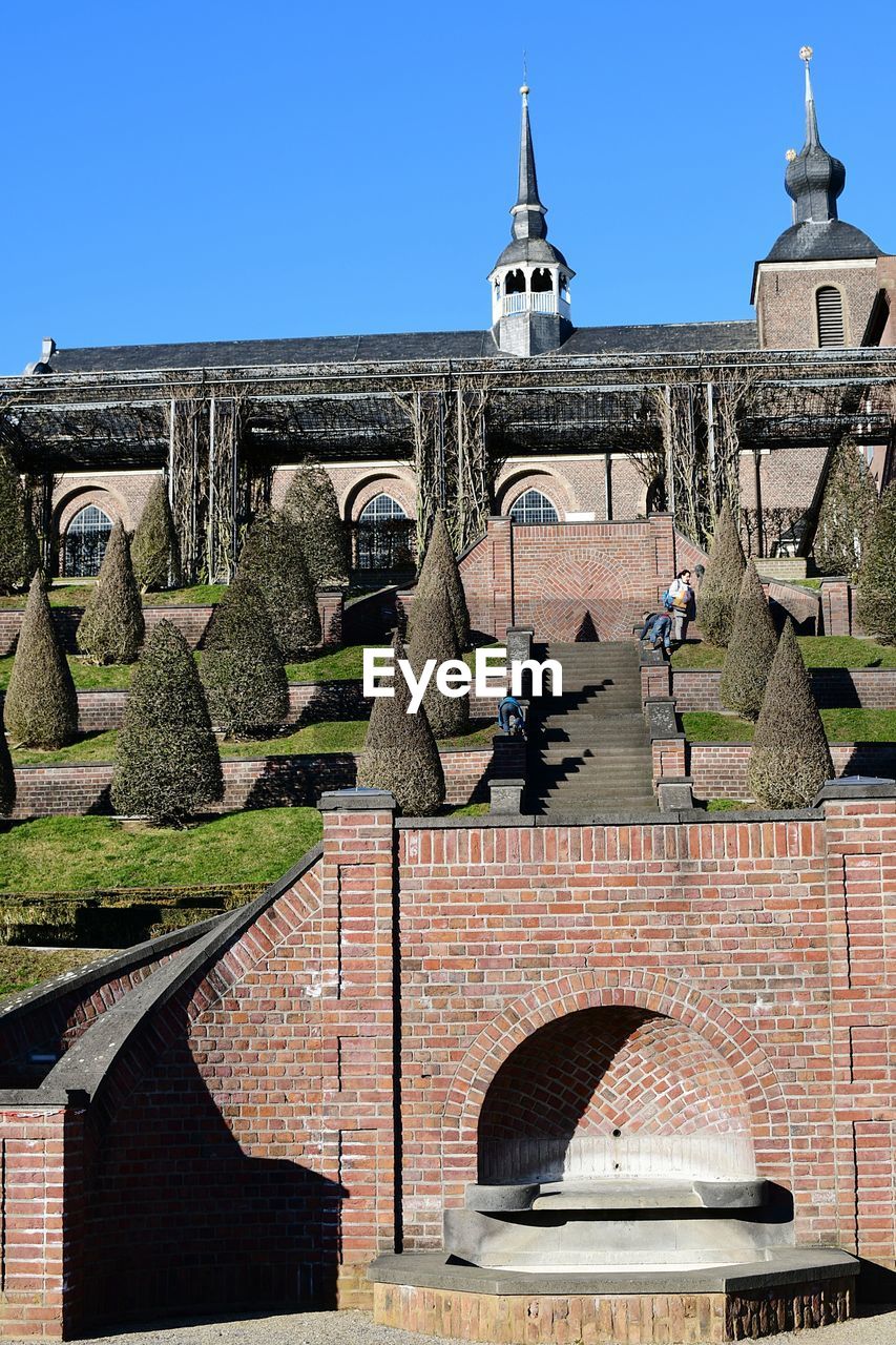 Exterior of historic building against clear sky