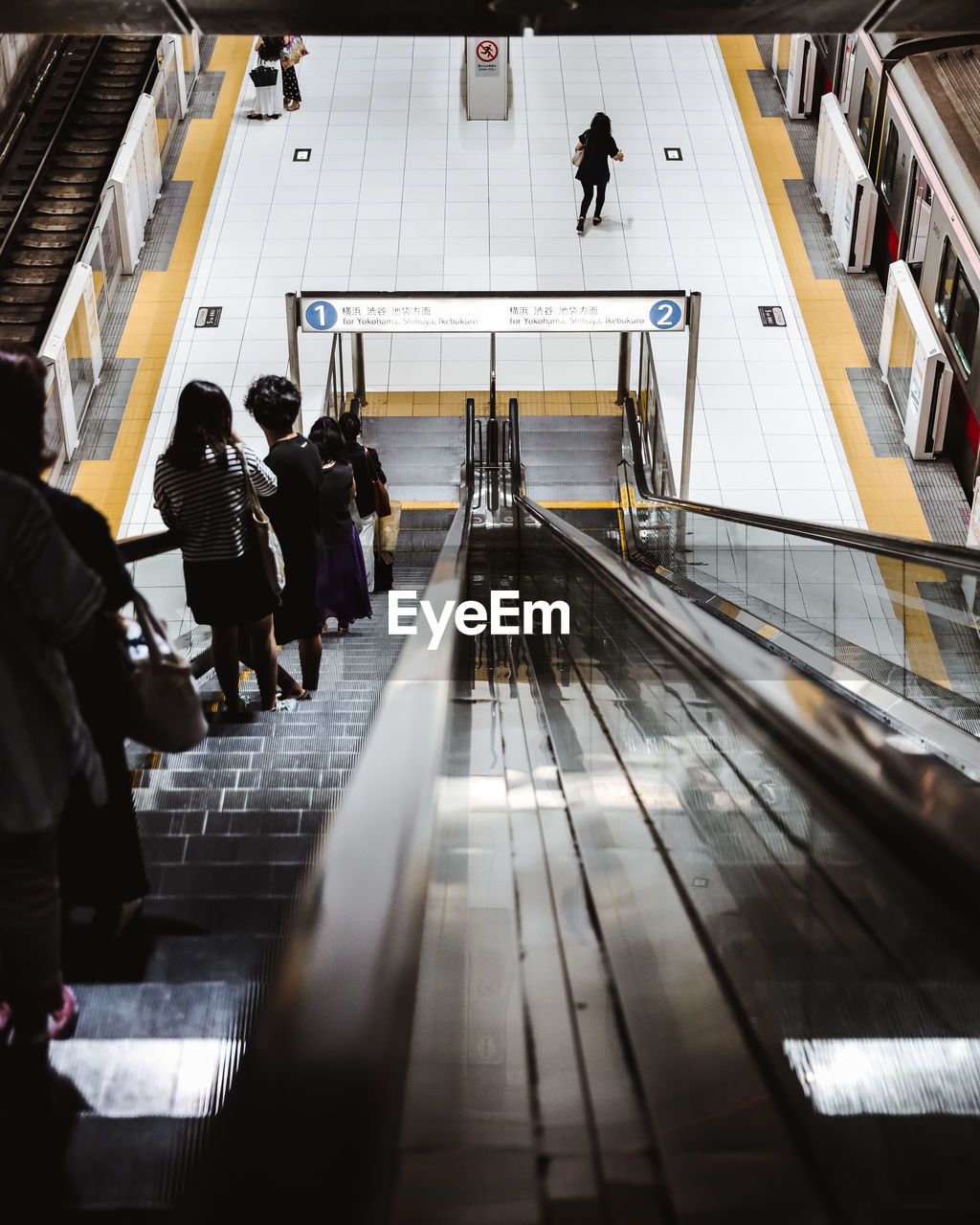 High angle view of people on escalator