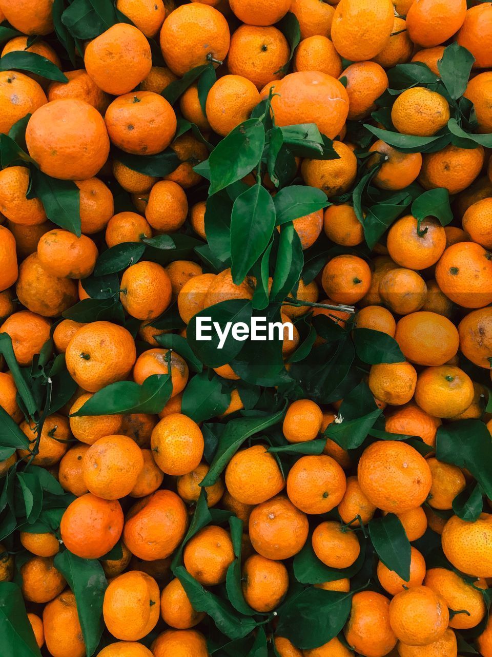 Full frame shot of oranges for sale at market stall