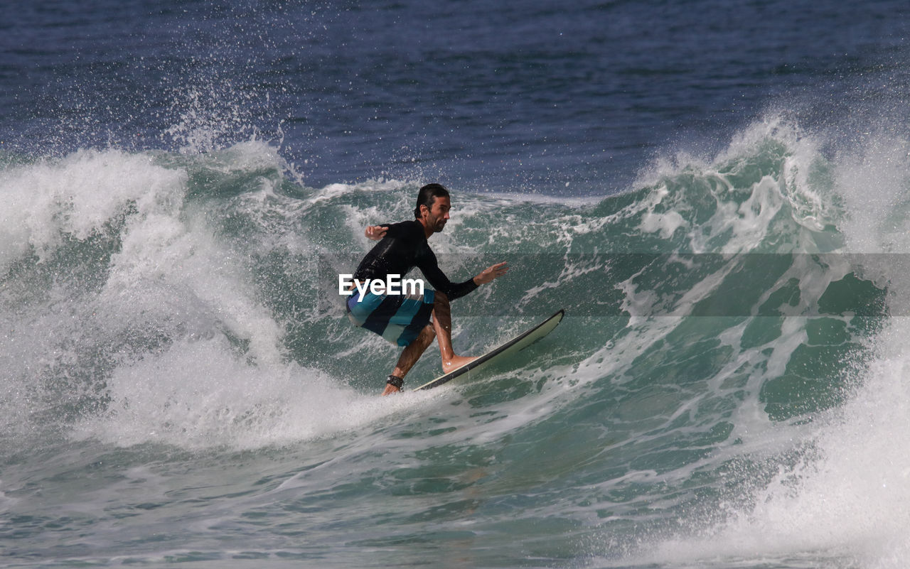 Man surfing in sea