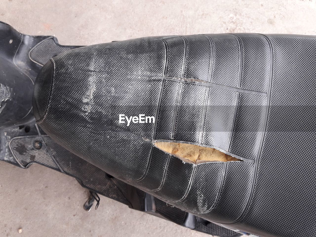 HIGH ANGLE VIEW OF UMBRELLA ON ESCALATOR