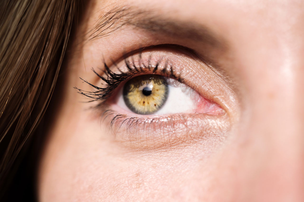 EXTREME CLOSE-UP OF WOMAN EYE