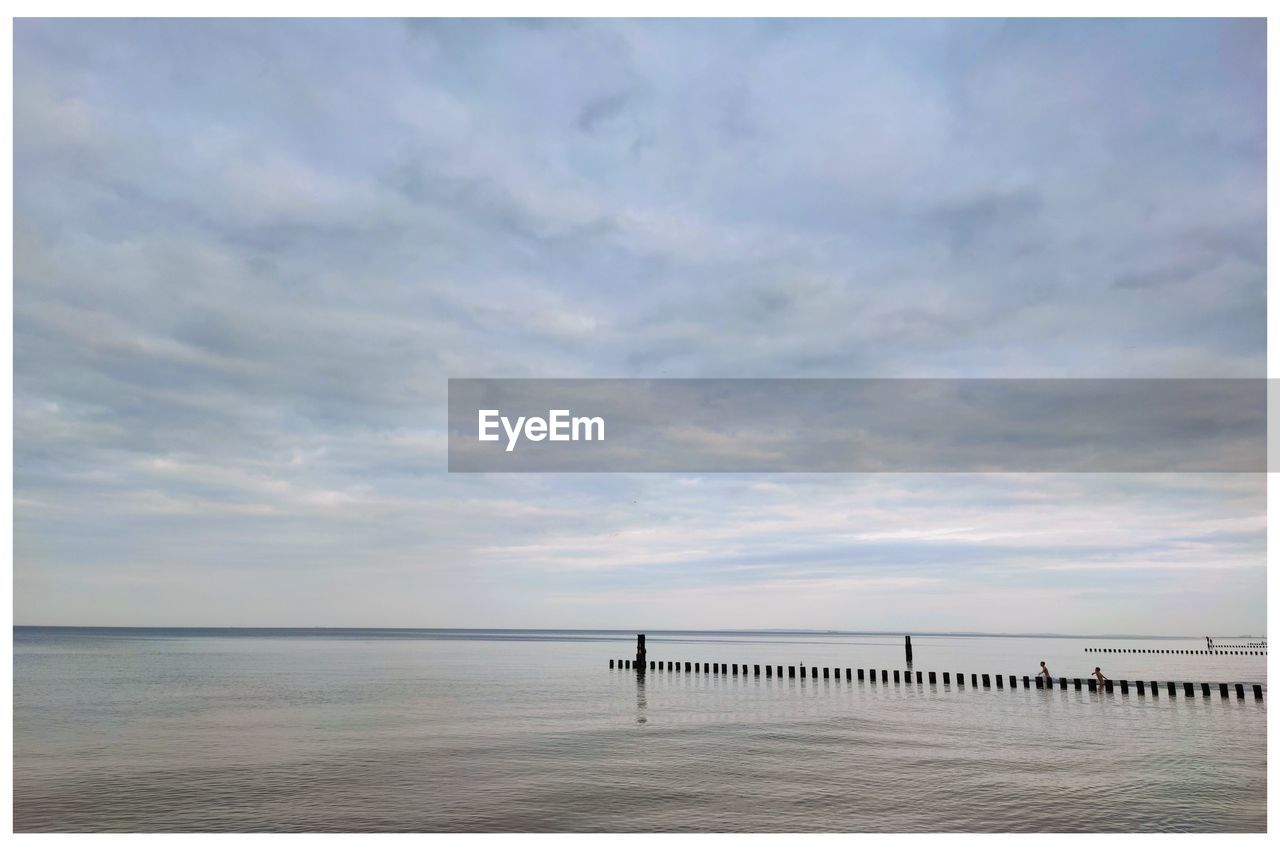 sky, water, sea, cloud, horizon, scenics - nature, horizon over water, nature, beauty in nature, tranquility, tranquil scene, transfer print, auto post production filter, beach, land, day, outdoors, no people, shore, copy space, idyllic, travel destinations, environment, non-urban scene