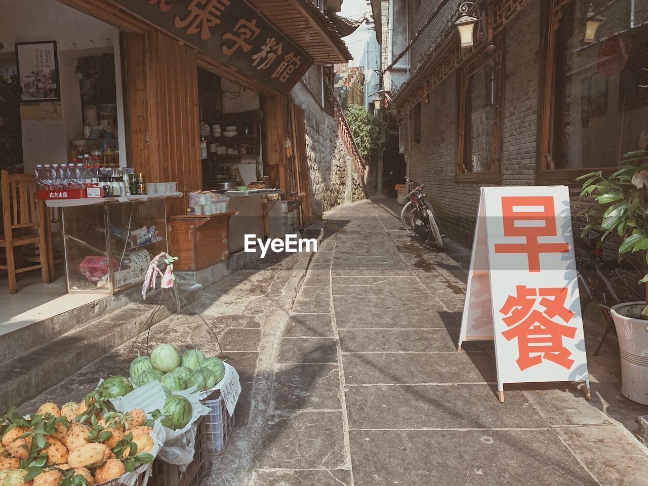 STREET AMIDST BUILDINGS AT MARKET