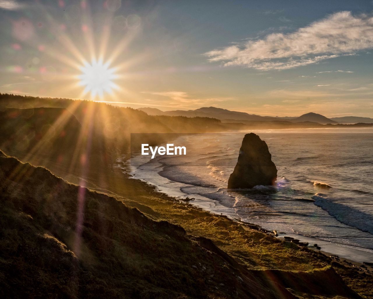 Scenic view of sea against sky during sunset