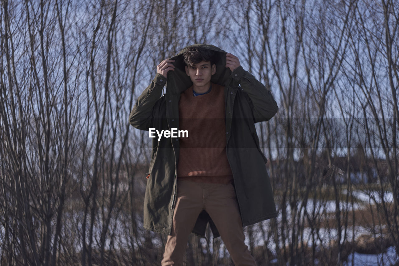 Man standing outdoors during winter