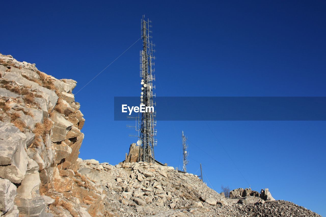Communication, telecommunication and television antennas, positioned of the mountains at the top.
