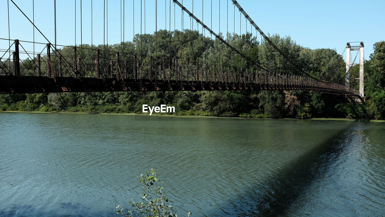 VIEW OF BRIDGE OVER RIVER