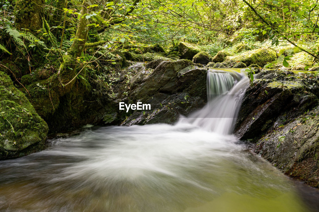 Long exposure of a waterfall on the hoar oak water river at watersmeet in exmoor national park