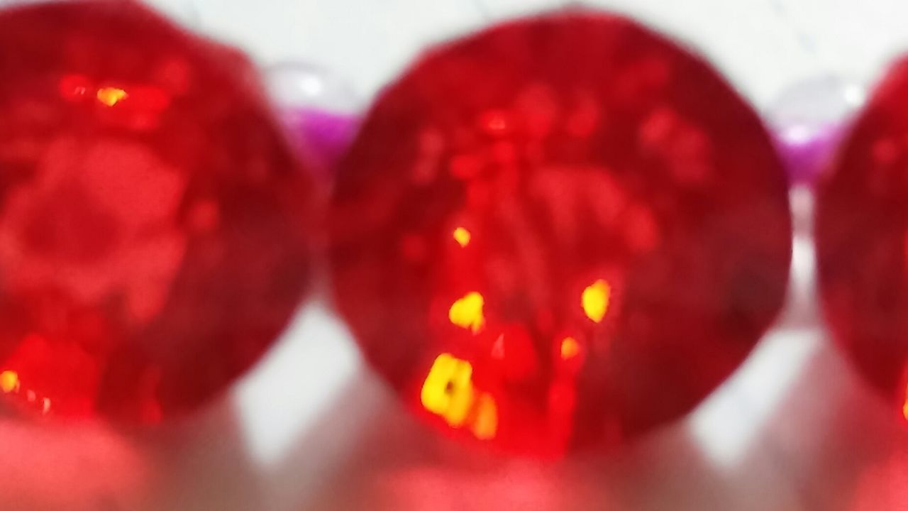 DEFOCUSED IMAGE OF MULTI COLORED BALLS