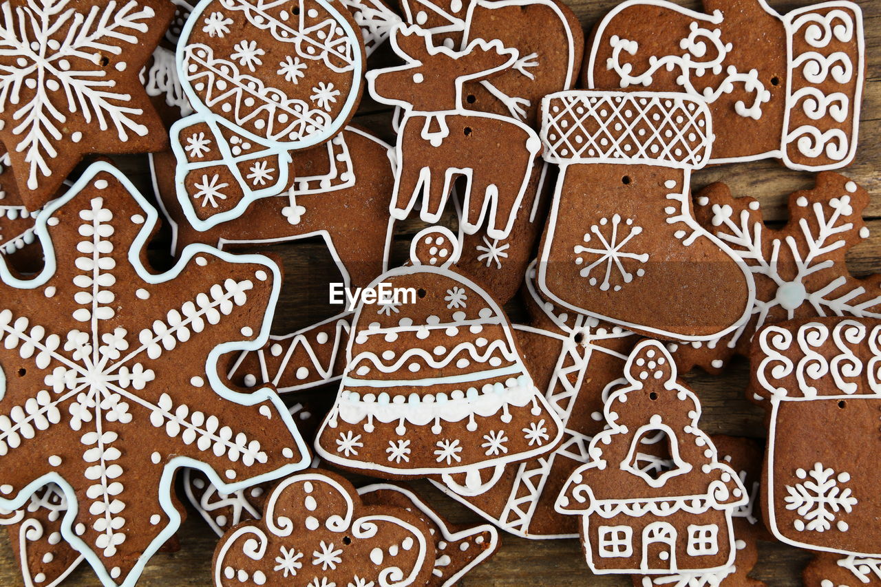 Close-up of christmas gingerbread cookies on wooden surface