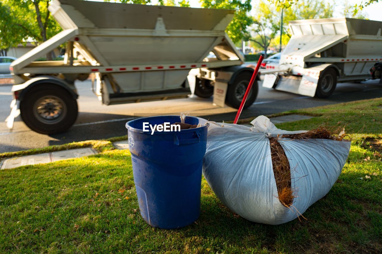 CLOSE-UP OF GARBAGE CAN