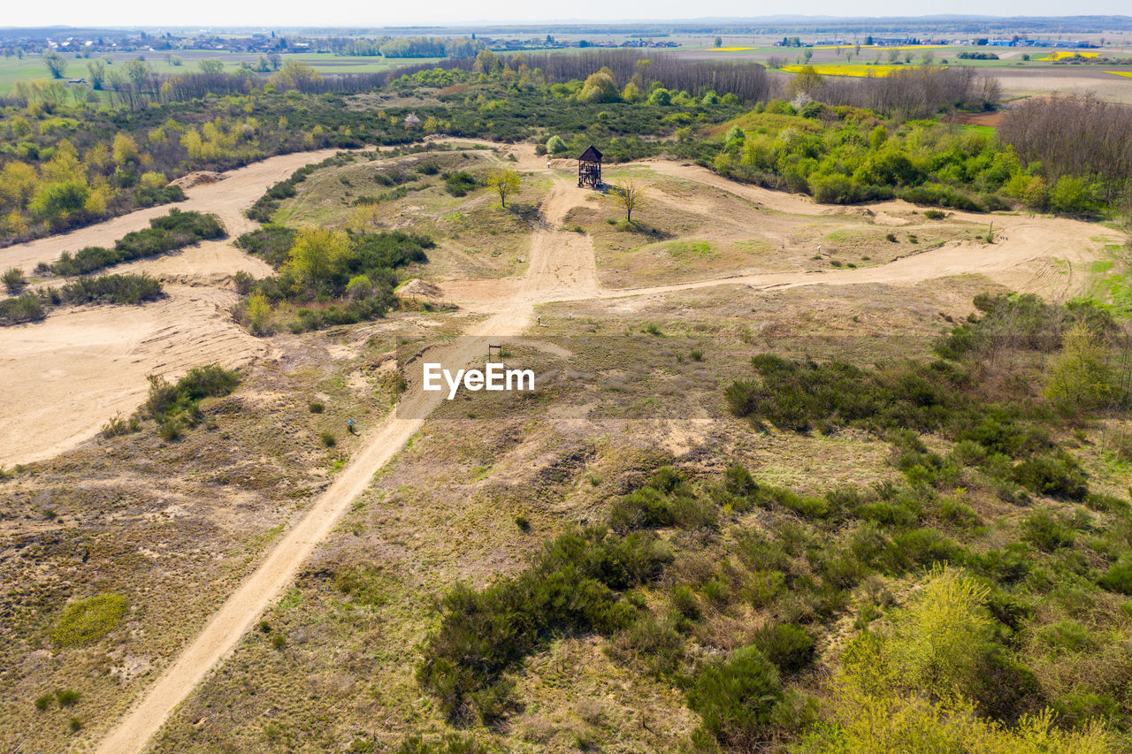 HIGH ANGLE VIEW OF AGRICULTURAL FIELD