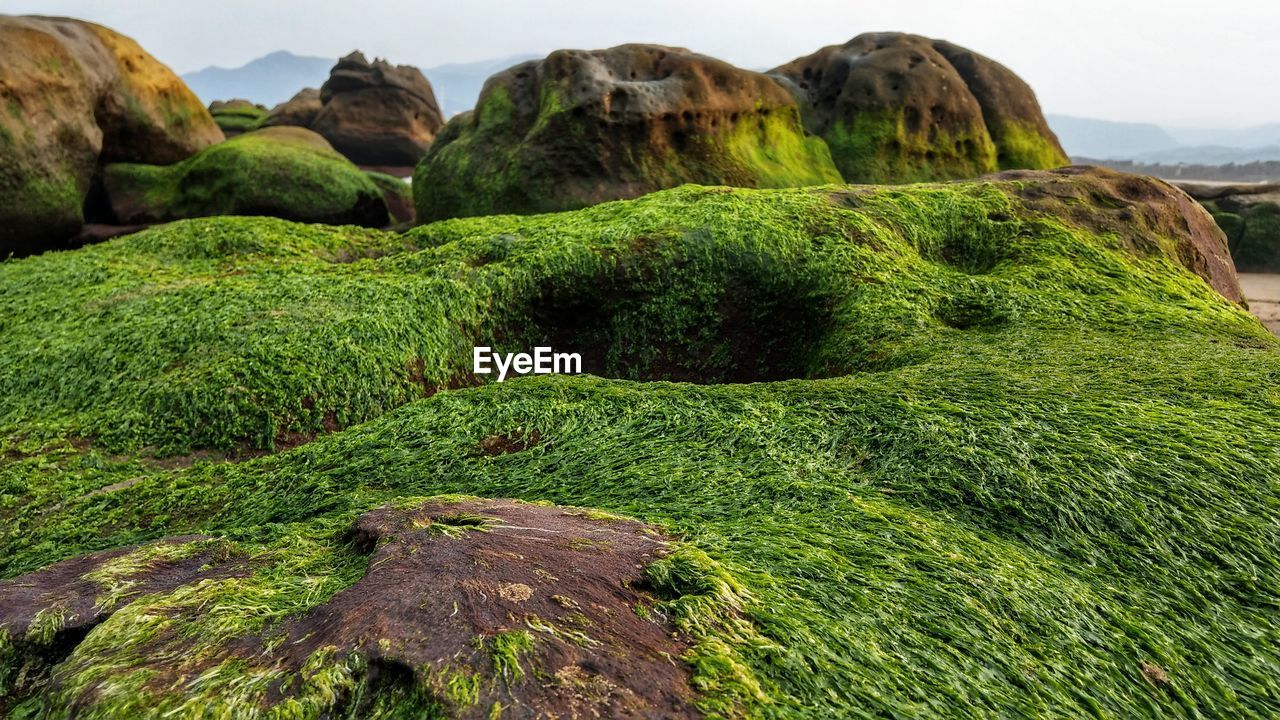 Scenic view of rocks against sky