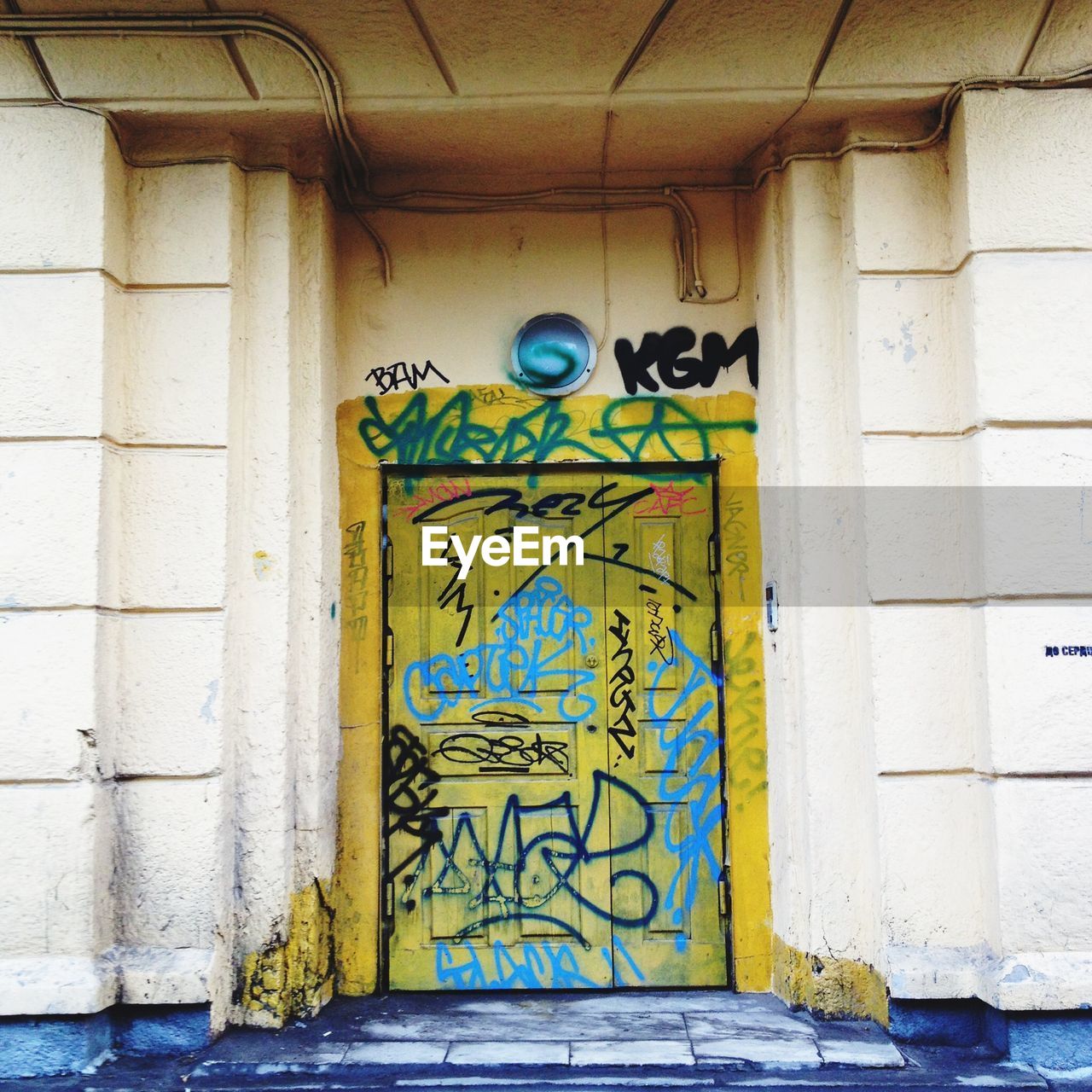 Low angle view of graffiti door on building