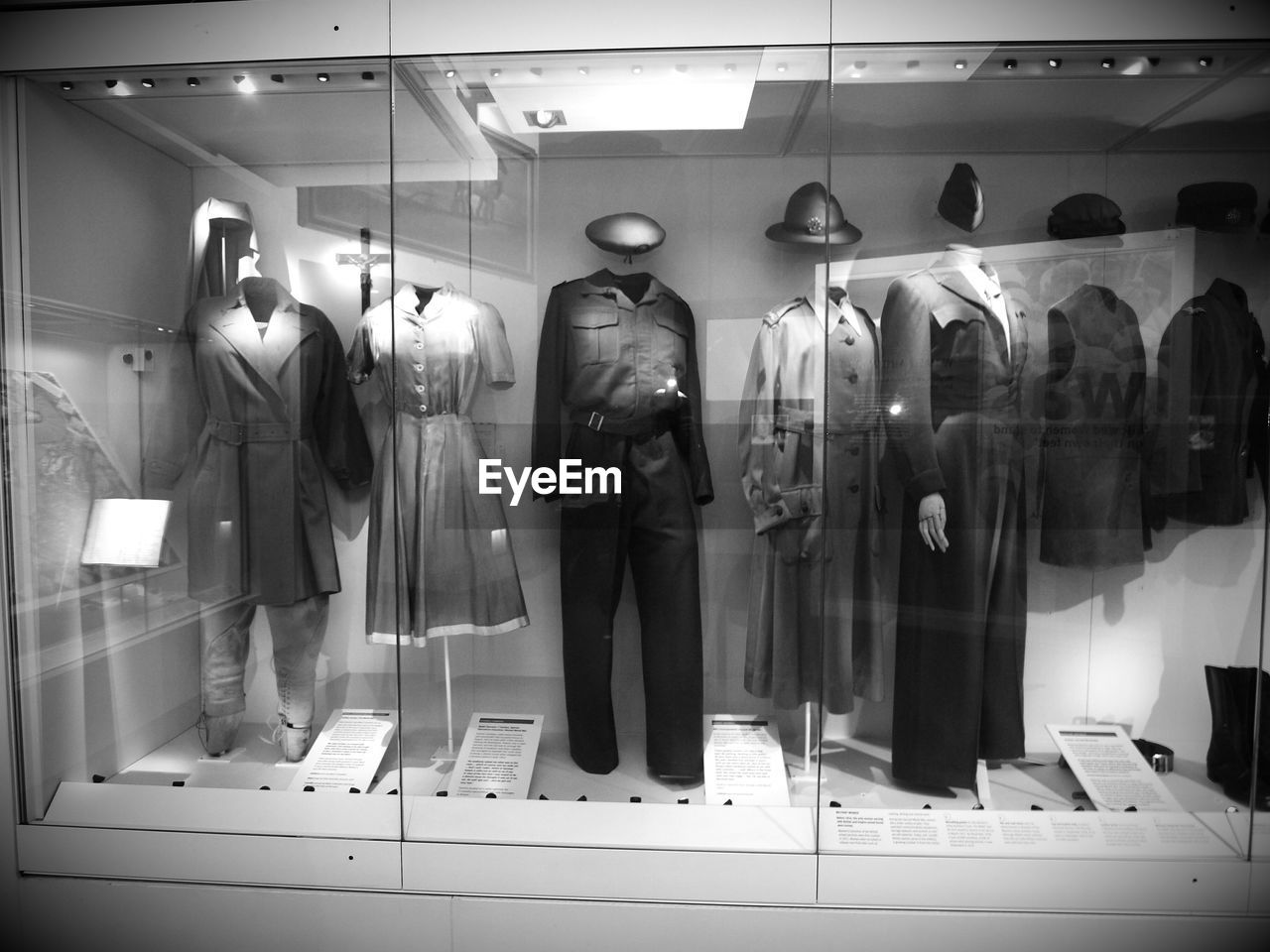 VIEW OF CLOTHES HANGING IN CORRIDOR