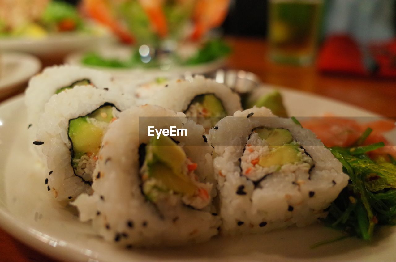 CLOSE-UP OF SUSHI SERVED ON PLATE