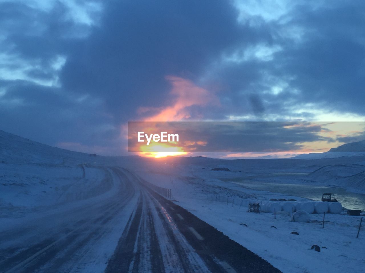 SCENIC VIEW OF DRAMATIC SKY DURING SUNSET