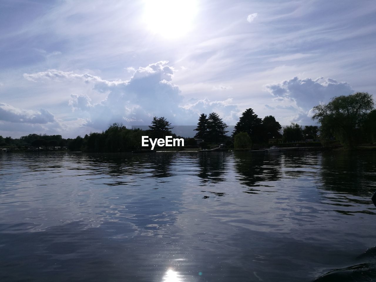 SCENIC VIEW OF LAKE AGAINST SUNSET SKY