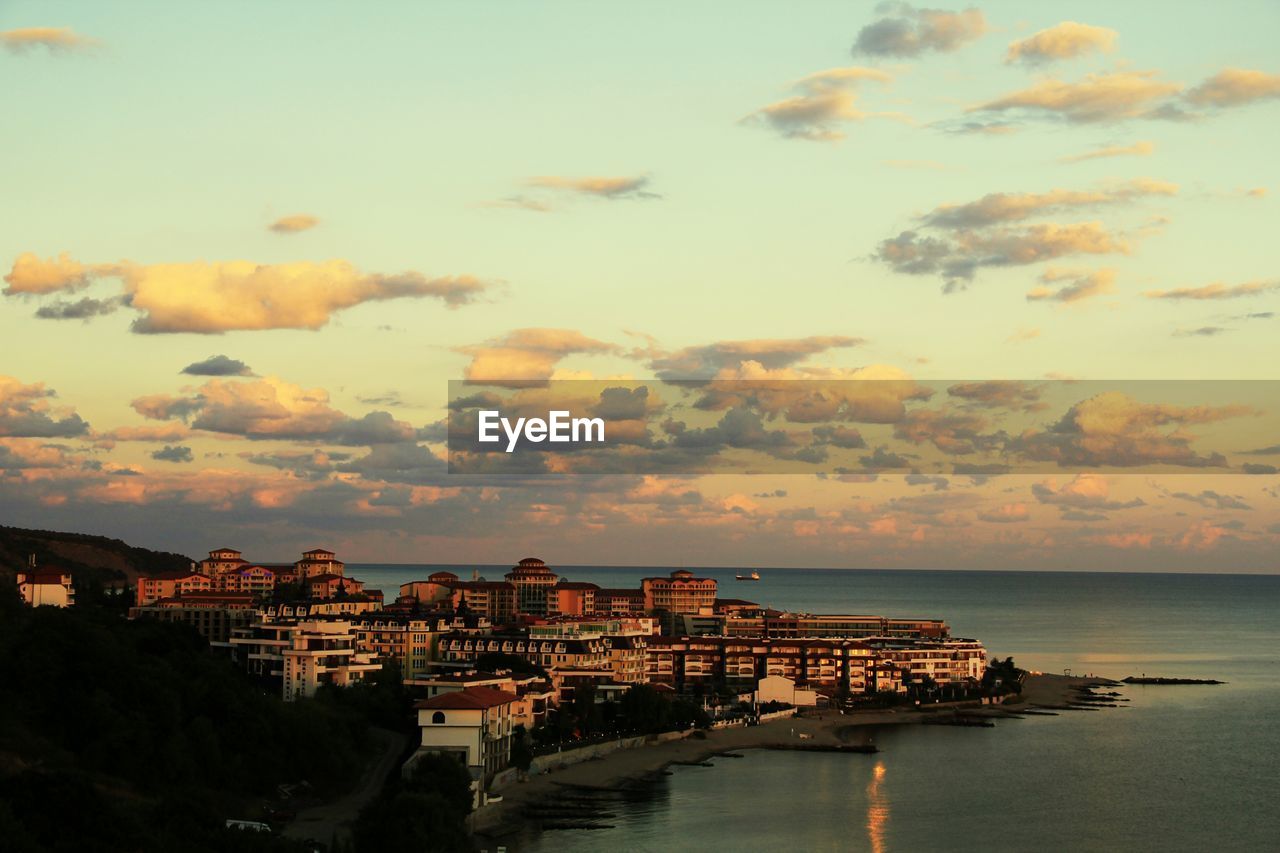 Black sea against sky during sunset