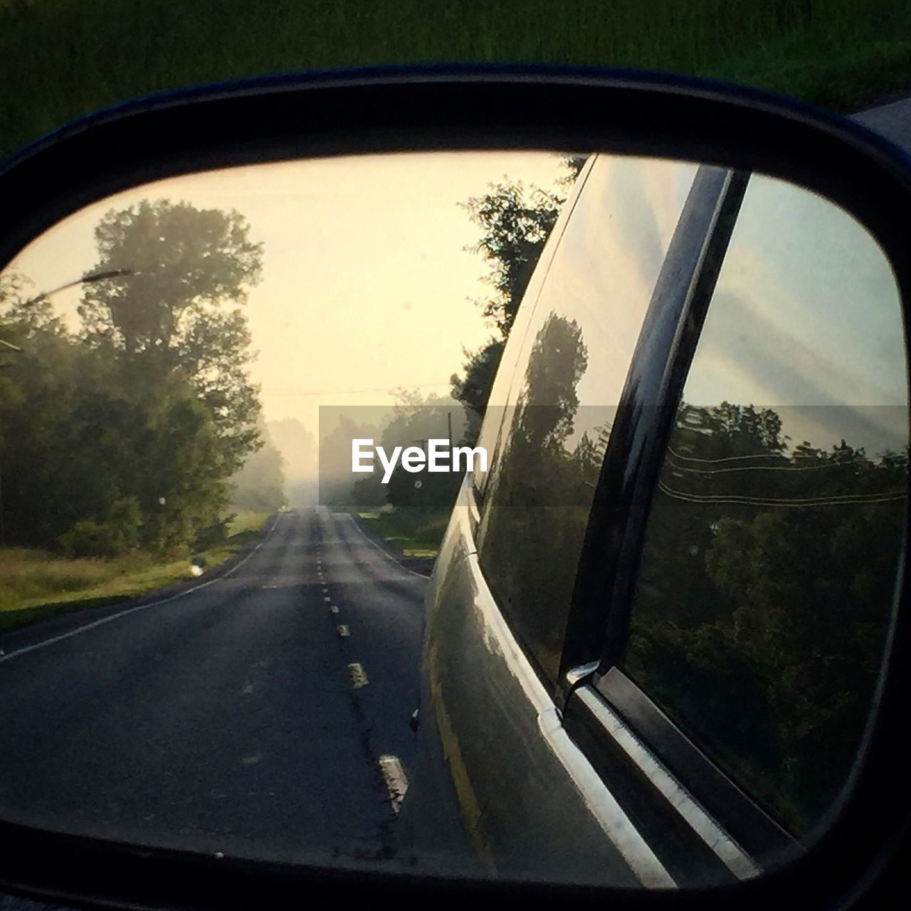 ROAD SEEN THROUGH WINDSHIELD