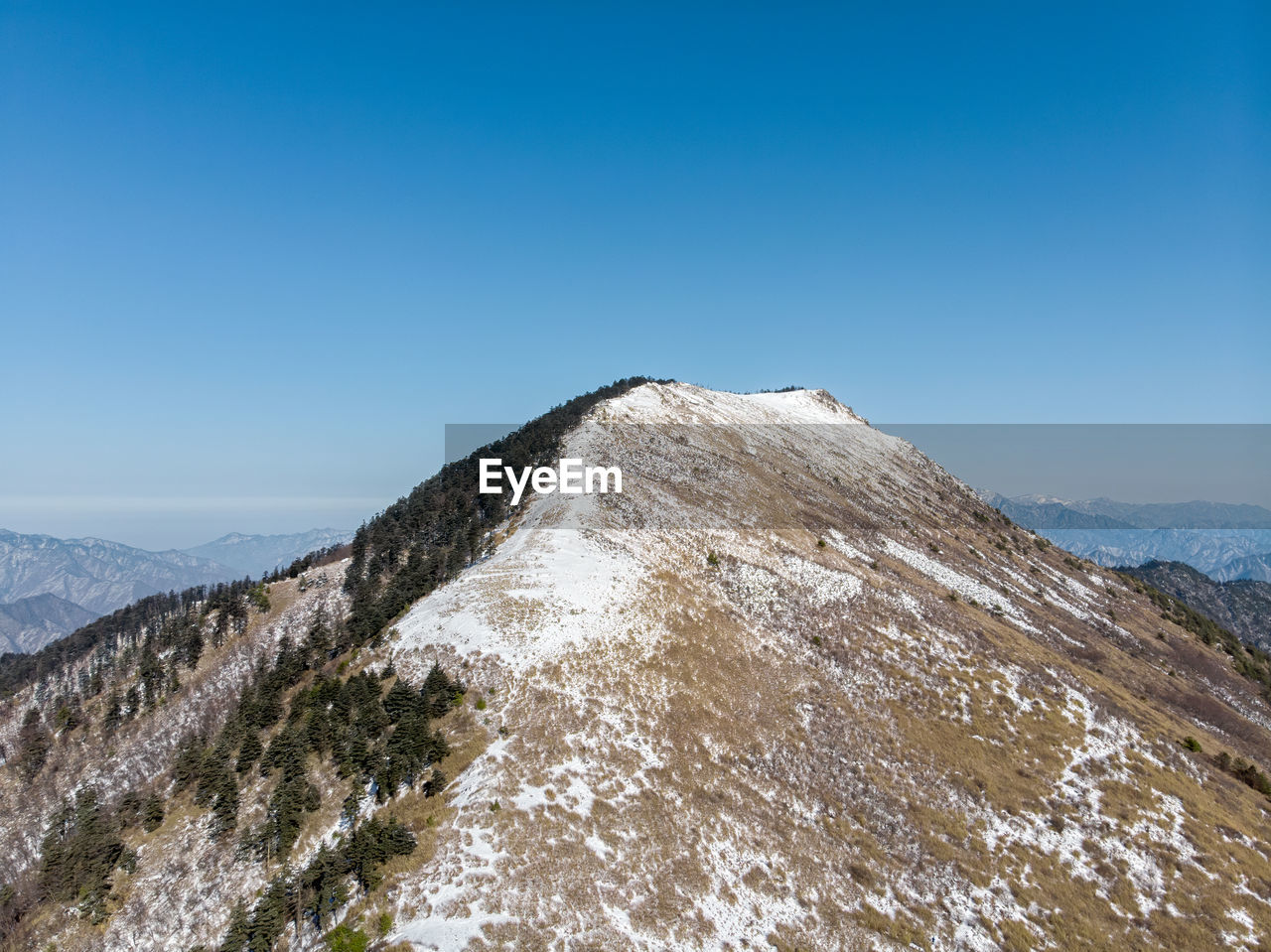 SCENIC VIEW OF MOUNTAIN AGAINST BLUE SKY
