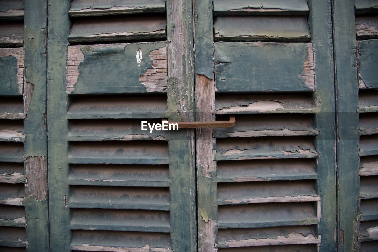 Full frame shot of old closed wooden windows
