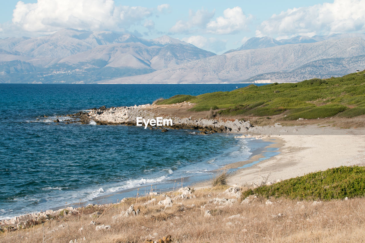 Scenic view of sea and mountains