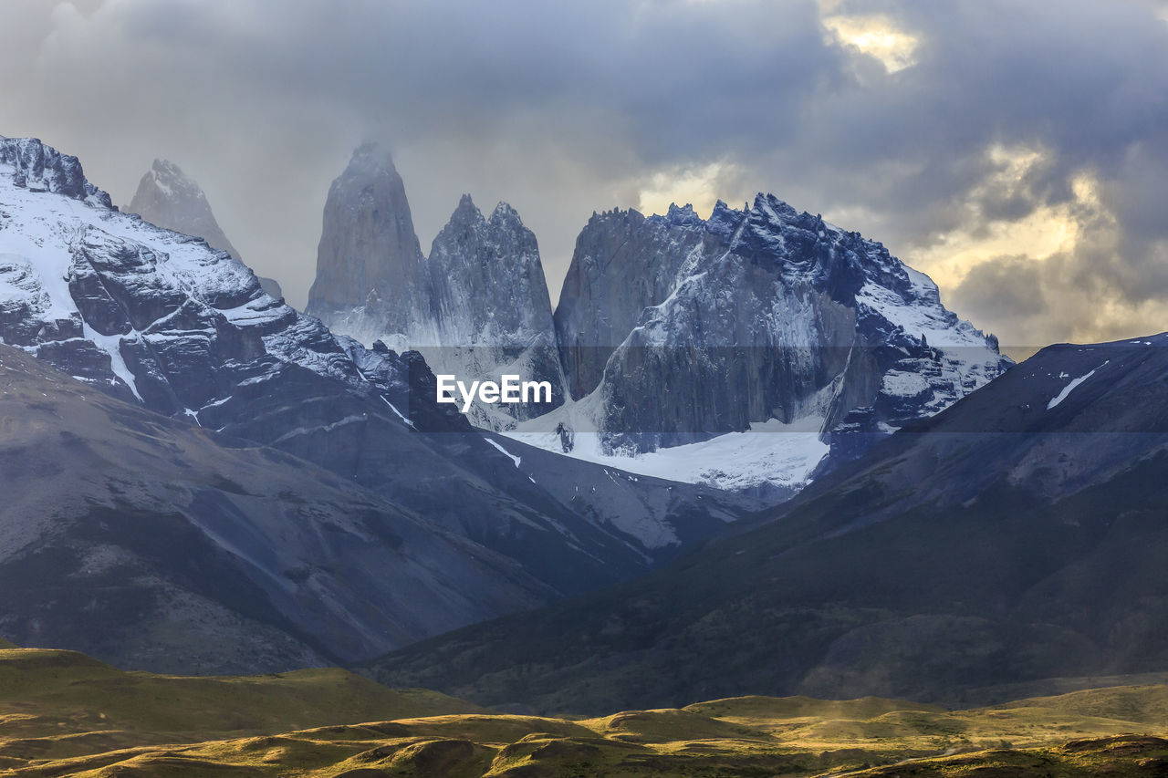 Scenic view of snowcapped mountains against sky