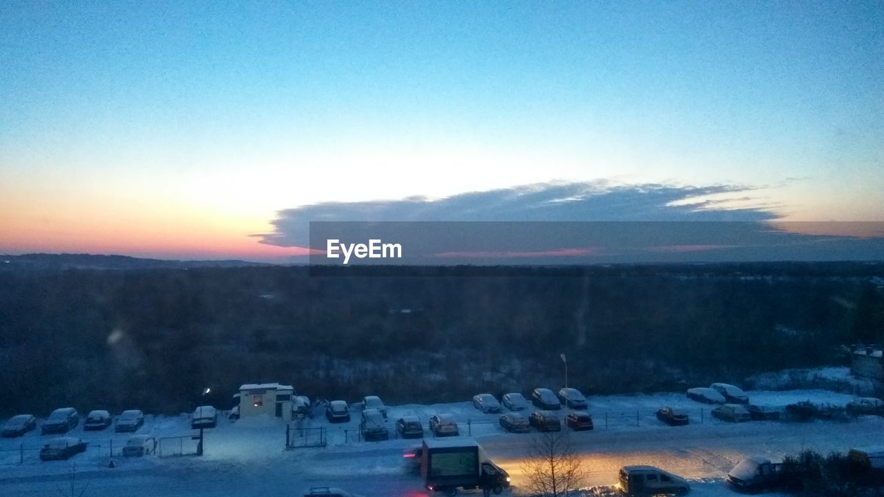 SCENIC VIEW OF SNOW MOUNTAINS AGAINST SKY