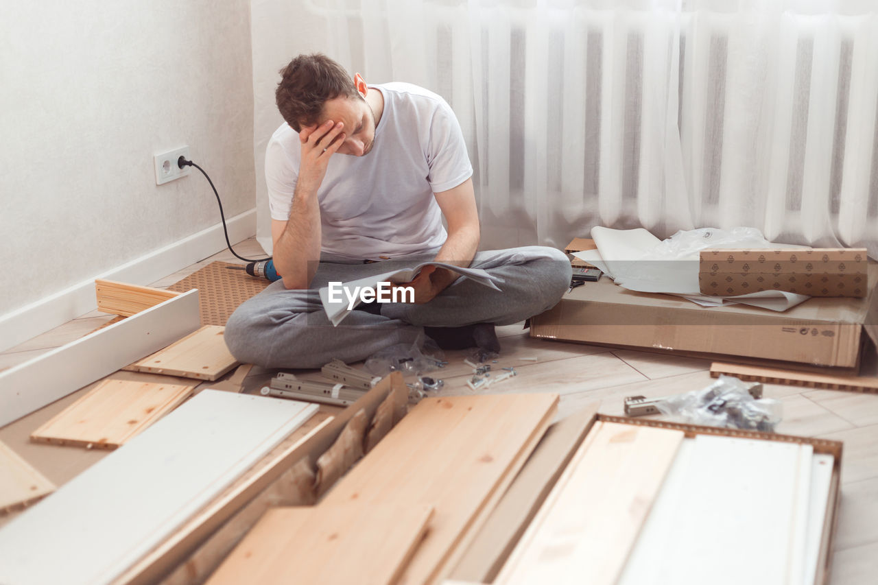 side view of man working at workshop