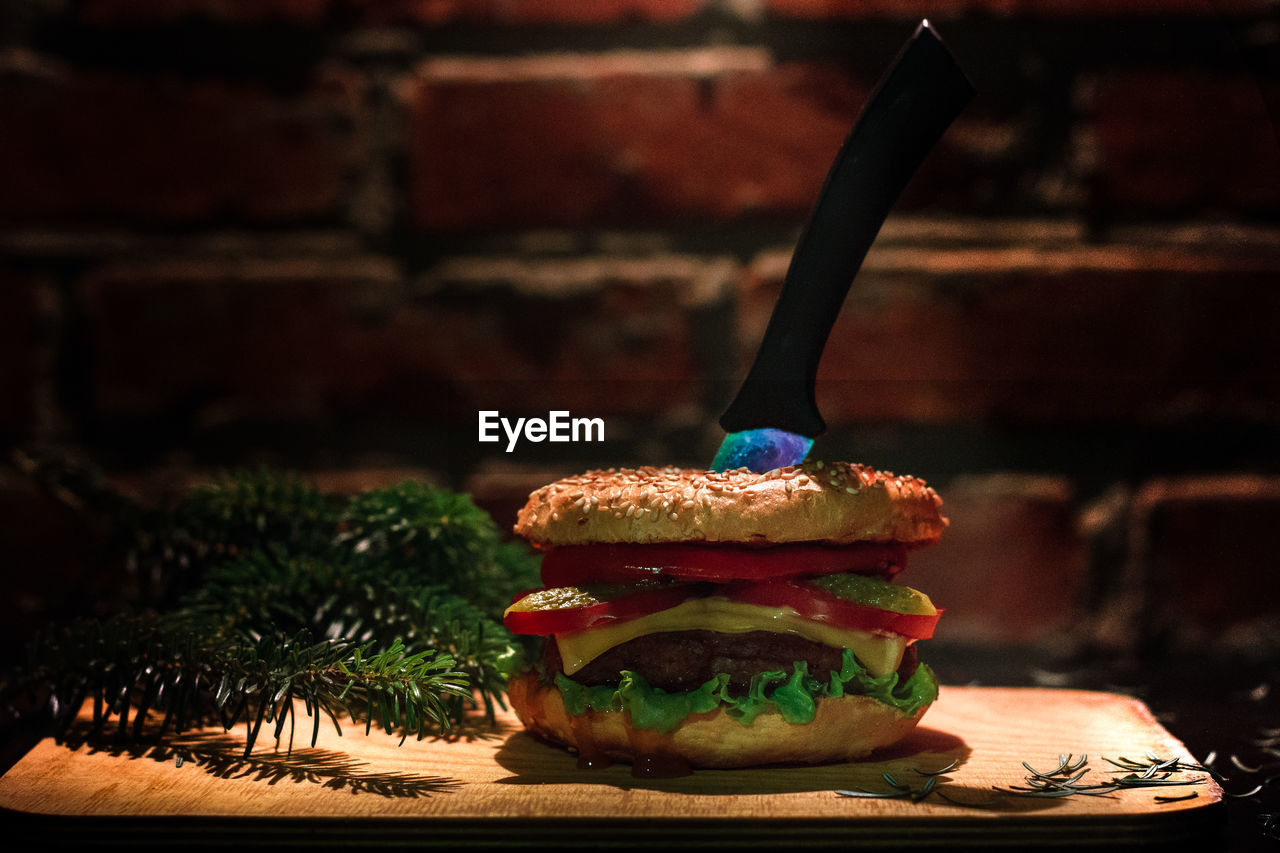 Close-up of burger on table in restaurant