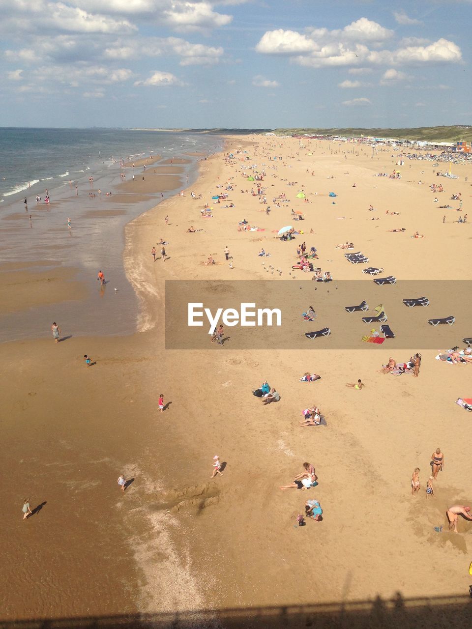 HIGH ANGLE VIEW OF PEOPLE AT BEACH