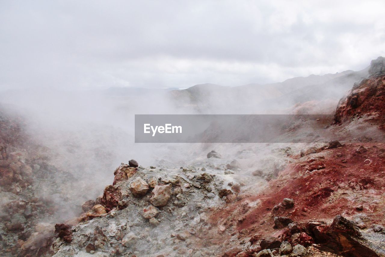 Scenic view of volcanic landscape against sky