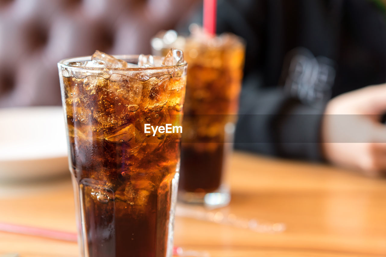 Close-up of beer glass on table